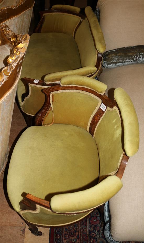 An Edwardian inlaid mahogany two seater settee and matching tub shaped armchair (2)